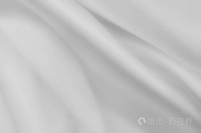 光滑典雅的白色丝绸或缎面豪华布质感.可用作婚礼背景