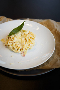  parmesan cheese served on white plate in gourmet restaurant.Foo