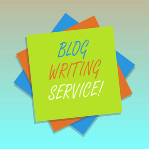 手写文本博客写作服务。概念的含义创建高质量的博客内容的业务多层空白表彩色纸纸纸照片与阴影
