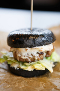  green lettuce salad leaves in crusty bun. Grilled beef meat pea