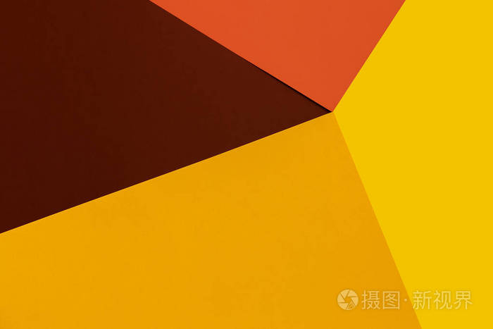 黄色,棕色和橙色背景.五颜六色的纹理.最小的概念.创意理念.流行艺术.