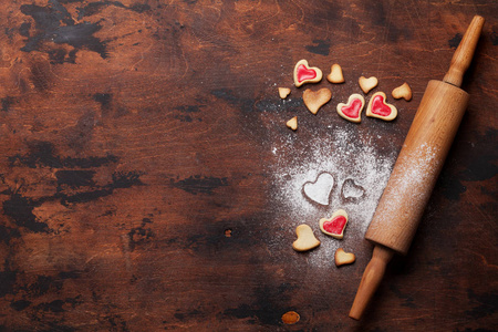 s day greeting card with cooking heart shaped cookies on wooden 