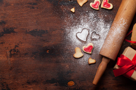 s day greeting card with cooking heart shaped cookies on wooden 