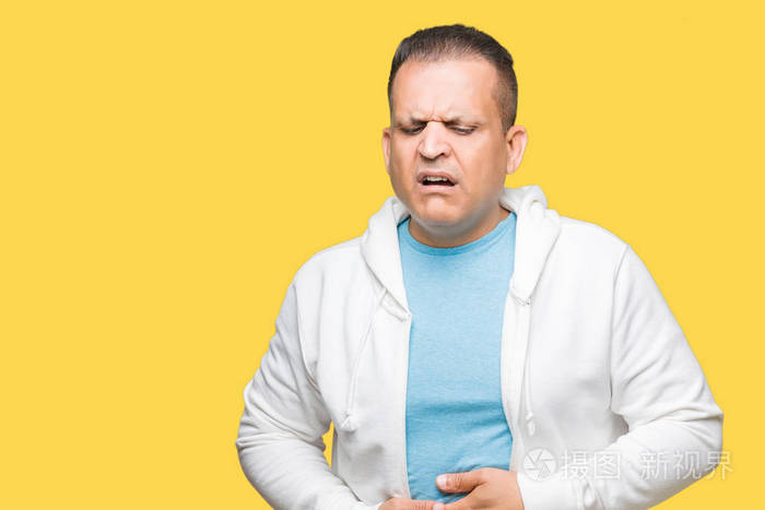 手放在肚子上,因为消化不良,痛苦的疾病,感觉不舒服