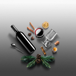 覆盖葡萄酒配方成分和厨房配件瓶红酒肉桂八角星橙色红糖和香料灰色背景。