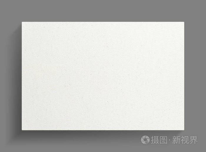 白色画布框架在灰色墙壁背景上,阴影柔和.