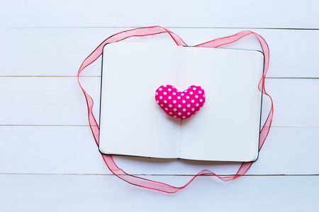 s hearts on white wooden background. Top view