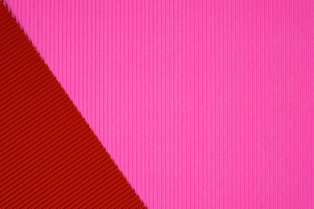 红色和粉红色瓦楞纸纹理用于背景。 生动的颜色与复制空间，以添加文本或对象。