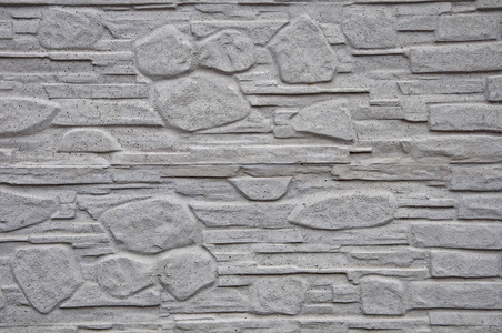 灰色混凝土墙的纹理和背景。 仿石。