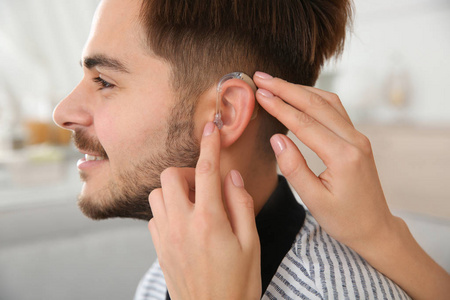 s ear indoors, closeup