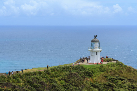 雷因加角灯塔，新西兰北部的一个旅游景点。照片中的水据说是塔斯曼海和太平洋相遇的地方