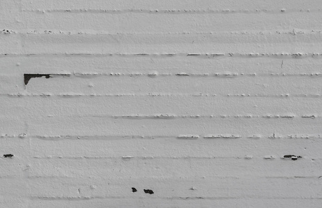 混凝土墙面纹理。 油漆白色旧裂缝墙面。 很好的背景
