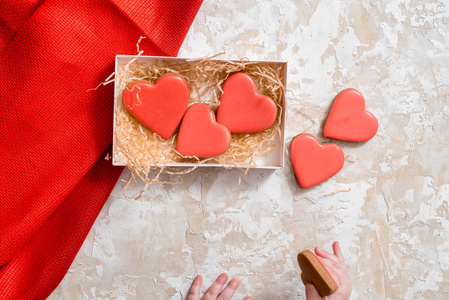 s Day on a background, Red icing, valentine hearts, top view. co