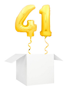 金黄数字41一个充气气球与金黄丝带飞行出空白白色箱子查出在白色背景