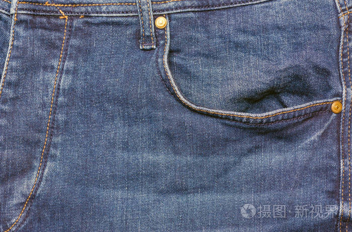 蓝色牛仔裤。复古蓝色牛仔裤纹理细节与口袋。牛仔时装背景口袋