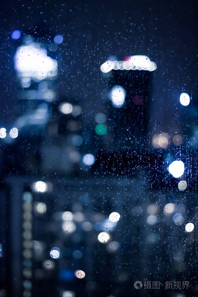 模糊的都市区夜间生活抽象的背景和现代暗色调的概念大城市的夜晚是