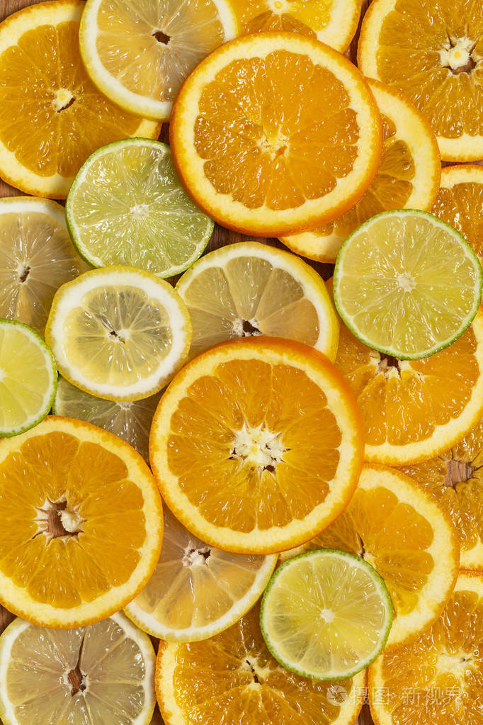 柑橘背景. 美丽的新鲜切片混合柑橘水果理念,健康饮食的顶级景观.