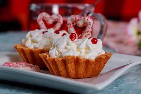 s Day is written on a decorative cupcakes with mascarpone cream.