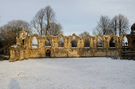 s  Abbey in York, England,in a snow covered museum gardens