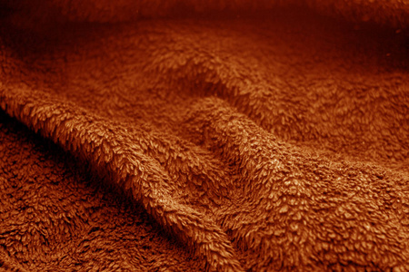 麻袋布质地，橙色模糊效果。 抽象背景和纹理。