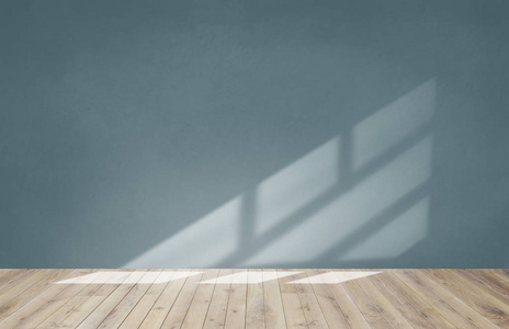 空房间的绿墙和木地板照片