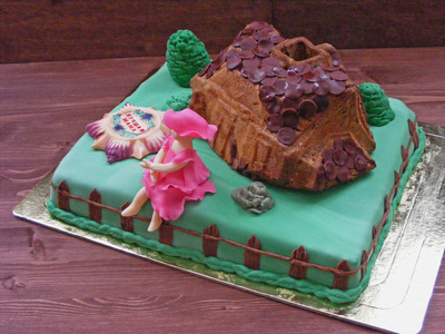 蛋糕农场覆盖着五颜六色的火锅和糖女孩的家