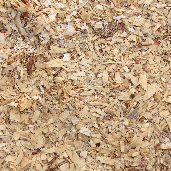 日光下一堆锯末的宏观孤立纹理