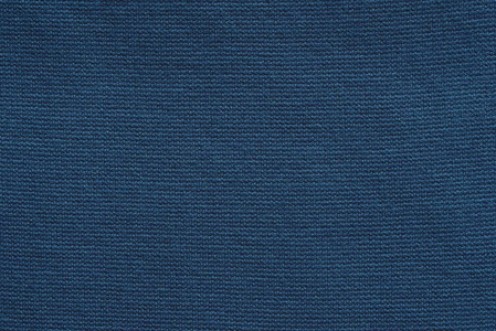 针织面料或时尚深蓝色面料的质地，均匀的背景或壁纸