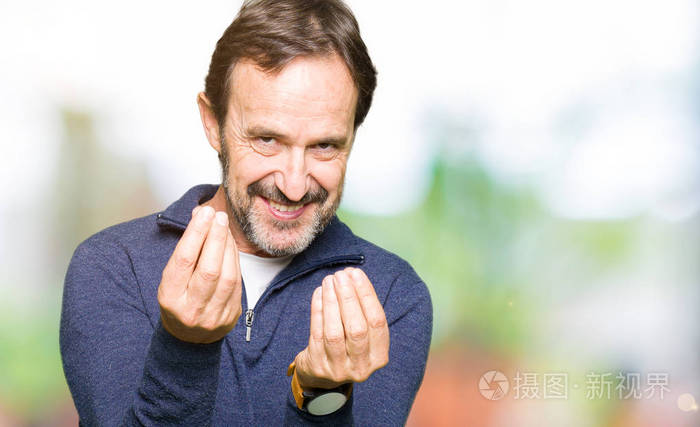 中年男子穿着毛衣,用手做钱的手势,要求支付薪水百万富翁生意
