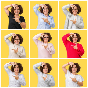 中年老年妇女拼贴黄色孤立背景微笑制作框架与手和手指与快乐的脸。 创造力和摄影理念。