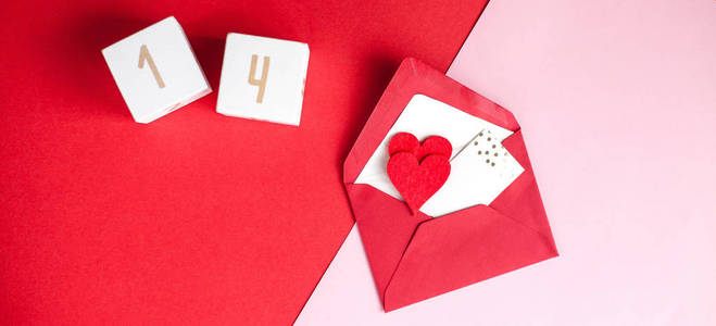 s day concept. Valentine, hearts, wooden cubes with numbers on a
