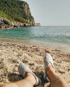 s feet on the Cleopatra beach in Turkey, Alanya