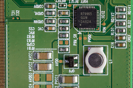 绿色电脑板与不同的电子元件。纹理