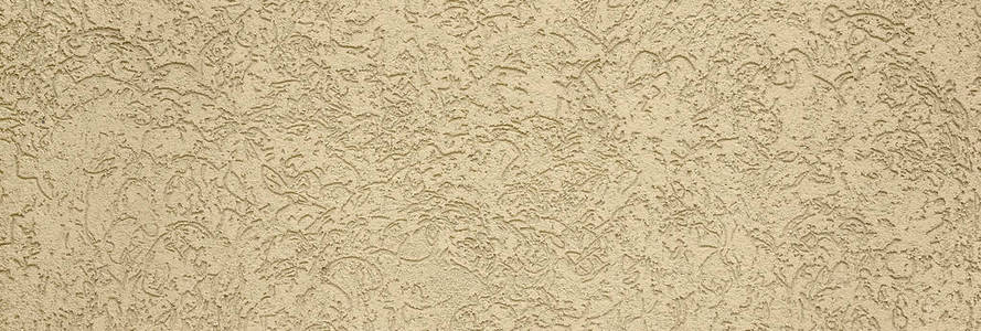 树皮甲虫风格的米色装饰石膏的质地。 俄罗斯装饰外墙的变化