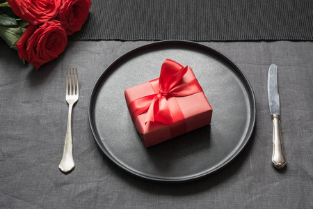 s day or birthday romantic dinner. Elegance table setting with r