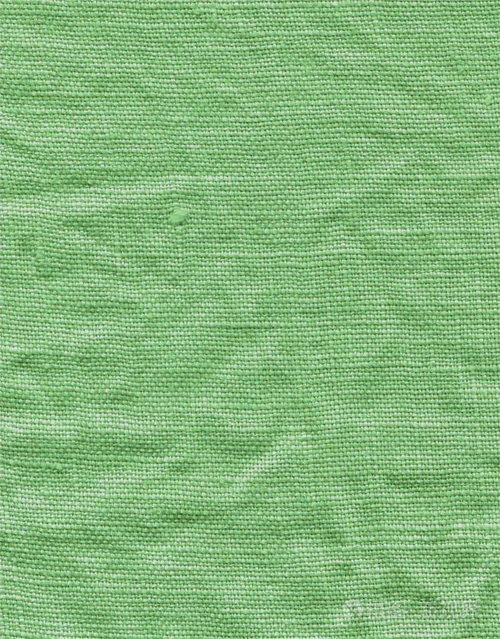 绿色织物表面为背景特写绿色织物表面天然绿色亚麻纹理