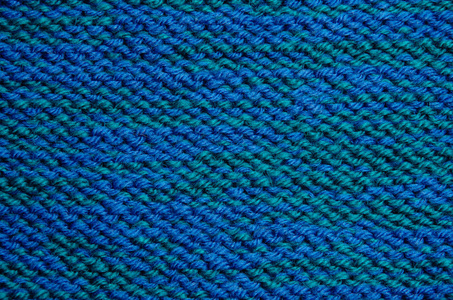 针织羊毛织物蓝色的质地。
