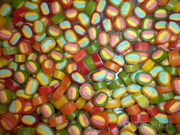 一堆多色甜迷你糖果照片-正版商用图片18jm6g-摄图新视界