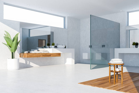现代浴室的角落，白色墙壁，混凝土和木制地板，白色水槽站在白色和木制台面和两个厕所。 3D渲染
