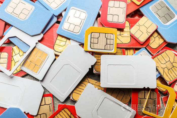 灰色背景特写上有许多sim卡照片-正版商用图片18lvji-摄图新视界