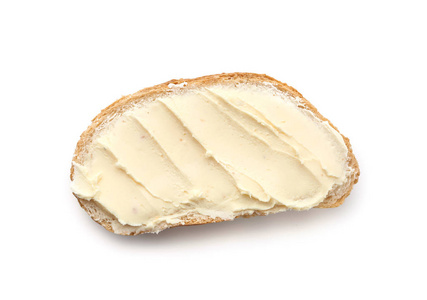 白色背景上加黄油的面包片