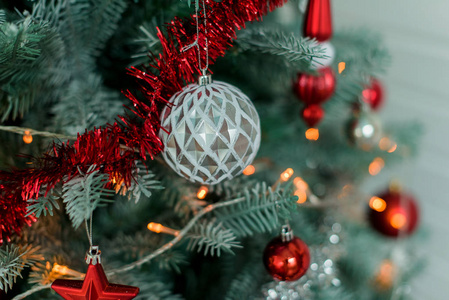 s decor. Christmas. Christmas tree decorated with garland and ti