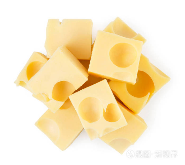 堆的奶酪立方体与孔在白色顶部的形式