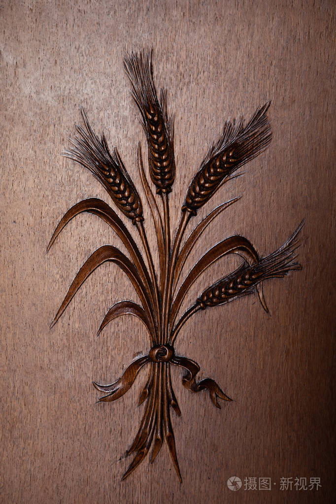 希腊雅典某希腊教堂木板装饰上的小麦雕刻花束