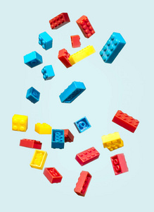 s toys. Circle geometric shapes on plastic bricks.