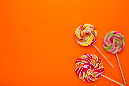 橙色棒棒糖图片