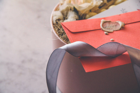 s day concept. Pink envelope, white sealing wax, postcard, note