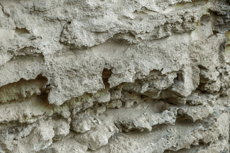 风化石,岩石,巨大的裂缝和被冲刷的空洞在崩塌和滑坡地震中的抽象的