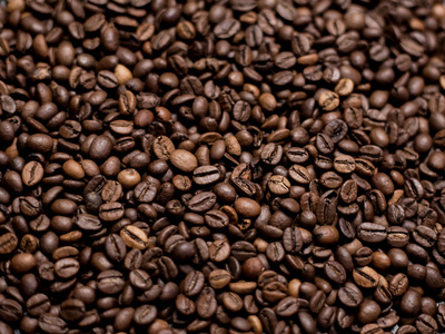 咖啡背景。烤咖啡豆, 顶视图