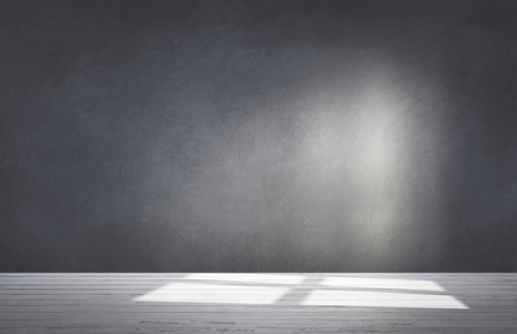 有混凝土地板的空房间里的黑墙照片